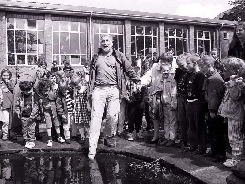 David Bellamy entertains children at Lydgate First School, Crosspool, Sheffield, as he drops by to open the new mini wildlife garden in June 1991