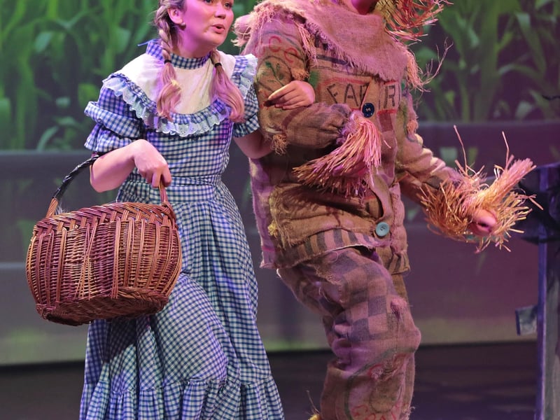 Caption: Andrea Crowe (Dorothy) and Oisin O'Reilly (Scarecrow)