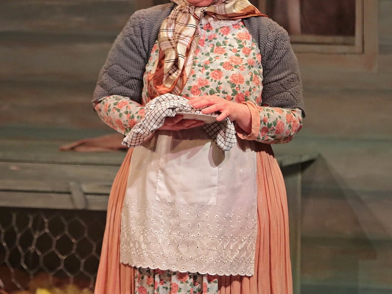 Caption: Sabrina Ryan as Aunt Em