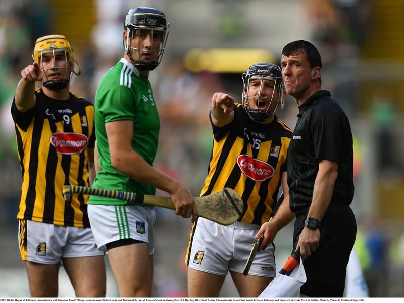 27 July 2019; Richie Hogan of Kilkenny remonstrates with linesman Paud O'Dwyer as team-mate Richie Leahy and Diarmuid Byrnes of Limerick look on during the GAA Hurling All-Ireland Senior Championship Semi-Final match between Kilkenny and Limerick at Croke Park in Dublin