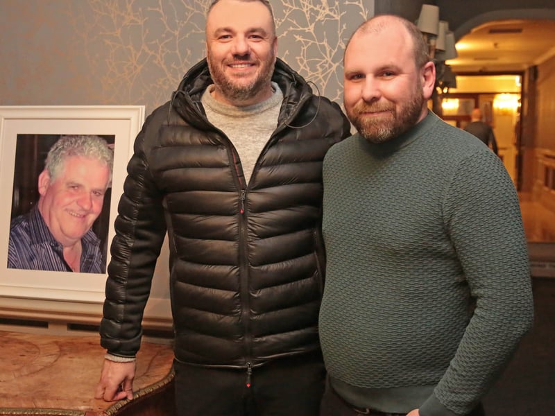 Caption: Kevin and David Hussey alongside a photo of the legendary Paschal Flaherty on Easter Monday in the Longford Arms Hotel