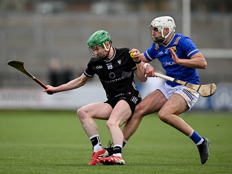 Caption: Ronan Molloy of Sligo in action against Martin Farrell of Longford during the Allianz Hurling League Division 4 final match between Sligo and Longford at Markievicz Park in Sligo. Photo by Seb Daly/Sportsfile