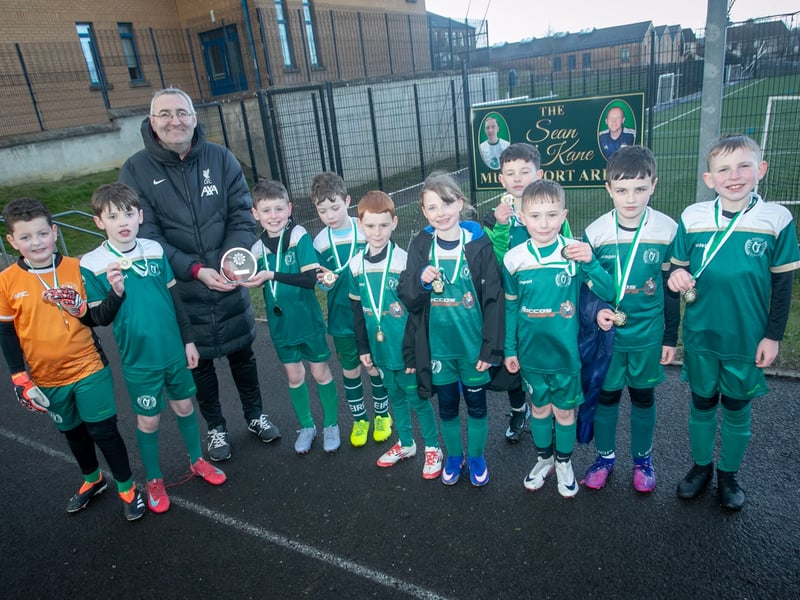 Mr. Gerry Beattie, Vice Principal, St. Joseph's Boys School presenting the 2017 Sean O'Kane Memorial Vase to Foyle Harps on Saturday last.