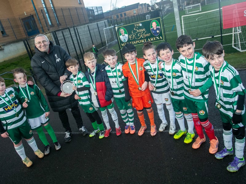 Mr. Gerry Beattie, Vice Principal, St. Joseph's Boys School presenting the 2017 Sean O'Kane Memorial Plate to Cockhill Celtic.