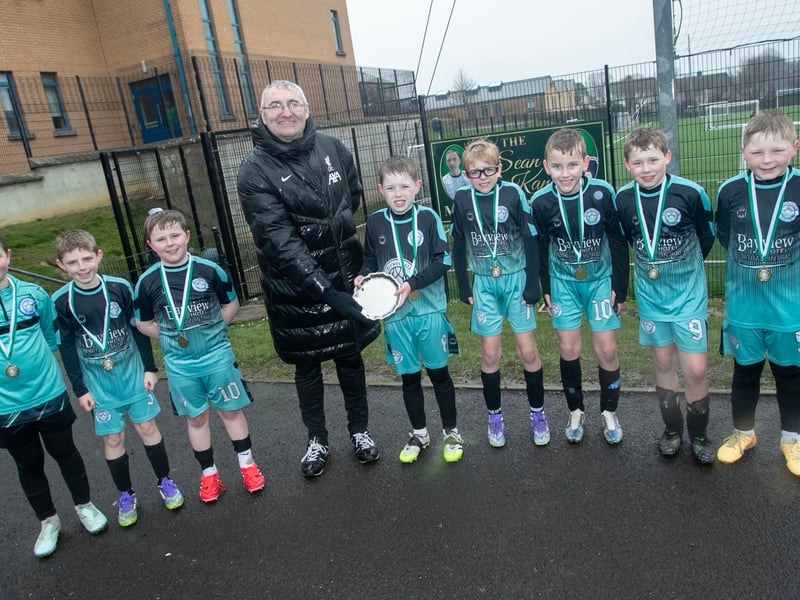 Mr. Gerry Beattie, Vice Principal, St. Joseph's Boys School presenting the 2016s Sean O'Kane Plate to winners Stranocum FC.