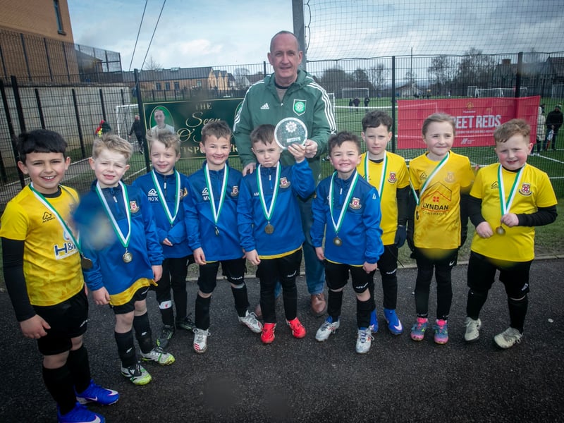 Mr. Feargal O'Kane presents the 2018s Sean O'Kane Bowl to winners, Limavady United.