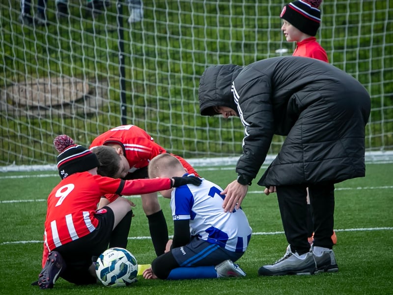 Showing concern for an opposing player during the 2018 game between Culmore and Tristar.