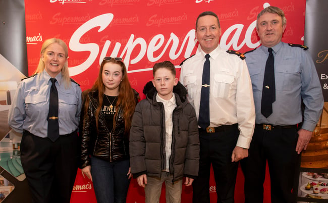 Garda Youth Award recipients Sophie Ward and Isaac McDonagh with Garda Grace Heffernan, Superintendent Tony Tighe and Garda Ciaran McCormack.