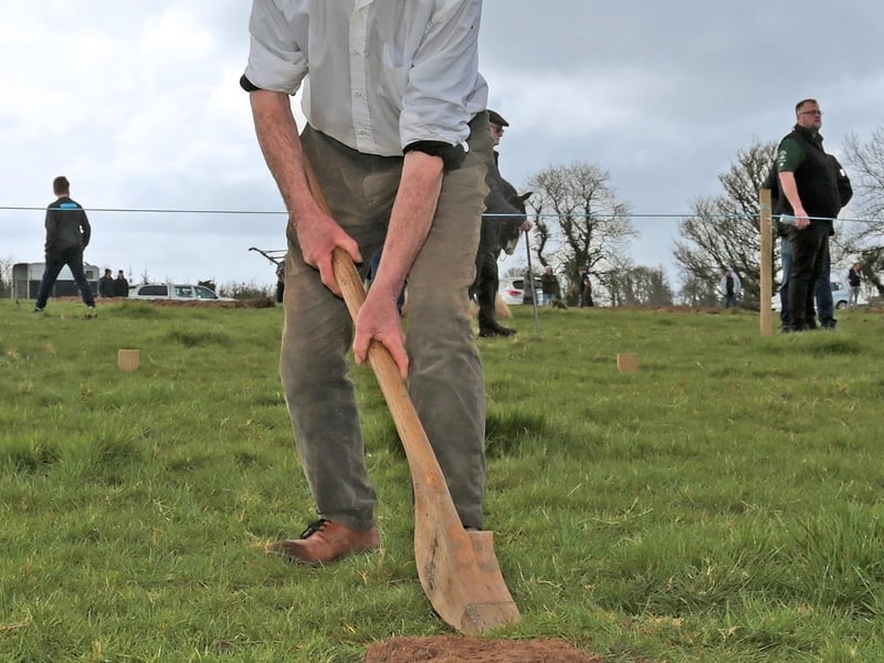 Caption: Kevin McNamee taking part in the Loy Digging