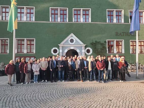 A delegation from Letterkenny was warmly received in Rudolstadt, Germany, for the town’s St Patrick’s weekend celebrations. Please click on the arrows to go through the galleryThe Letterkenny delegation received a warm welcome to Rudolstadt. Also pictured are students from St Eunans College who took part in an exchange programme The two towns have been twinned since 2018, thanks to Letterkenny native Karol Kerrane. Karol lives in Rudolstadt and founded the Letterkenny Irish Pub in the town. Through him, and Rudolstadt Mayor Jörg Reichl, the two towns have enjoyed close relations with the official twinning over the years. A delegation from Rudolstadt visits Letterkenny each year in the autumn, and a student exchange takes place with students from St Eunans College, Coláiste Ailigh, and Errigal College with local schools in Rudolstadt. This year, the Letterkenny delegation included local councillors Donal Coyle, who represented the Letterkenny-Milford Municipal District on behalf of his Fianna Fáil colleague Caothaoirleach Ciaran Brogan, as well as Fine Gael Cllr Jimmy Kavanagh and Sinn Féin Cllr Gerry McMonagle. Cllr Coyle officially launched the St Patrick’s weekend festival and praised the power of music to bring people together. Local bands Bellows & Beats and The Soggy Bottom Boys, as well as musicians John Muldowney, Cathal Mac Fhloinn, Domhnaill Mac Fhionnlaoich and Grace Nugent were all invited to represent Letterkenny’s impressive music scene. The St Patrick’s weekend festival lasted from Friday to Sunday and included plenty of live music performances. The Letterkenny delegation were treated to a packed itinerary during their visit from Thursday to Monday, exploring local attractions and learning about the rich history of Rudolstadt and the surrounding region of Thuringia. The group were officially welcomed by Mayor Reichl upon arrival in Rudolstadt on Thursday. Letterkenny representatives received a tour of the nearby Volkstedt porcelain factory, led by guide Marie Simon, and