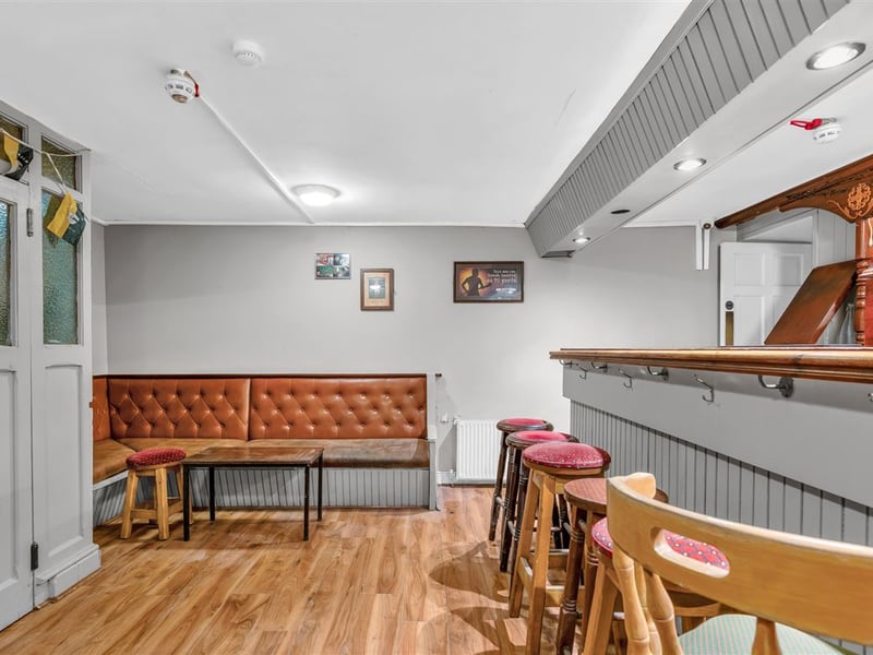The Railway Yard Inn in Moneenroe, near Castlecomer, County Kilkenny, has been listed for sale on Daft.ie, offering buyers the chance to take on a well-known rural pub along with living accommodation and a substantial outdoor area. The property includes a fully fitted bar and lounge area along with a private residence, making it a potential lifestyle business for anyone looking to run a traditional Irish pub. Set on roughly two acres of land with frontage onto two roads, the site also features a large yard and additional outdoor space, which could offer further development potential subject to planning permission. TAP NEXT FOR NEXT PIC Inside, the pub retains plenty of traditional character, with a cosy bar area that has served locals and visitors alike over the years. READ NEXT: Proud Kilkenny man to star in new series of The Great House Revival on RTE The attached residence provides private accommodation for owners, making it an attractive option for buyers seeking both a home and business opportunity in a rural Kilkenny setting. Located in Moneenroe, just outside Castlecomer, the pub sits in a scenic part of the county that is popular with locals and visitors exploring the surrounding countryside. READ NEXT: FEATURE: Kilkenny parishioners pull together to save their local pub The guide price for the property is €398,950. CLICK HERE FOR MORE LOCAL PROPERTY STORIES