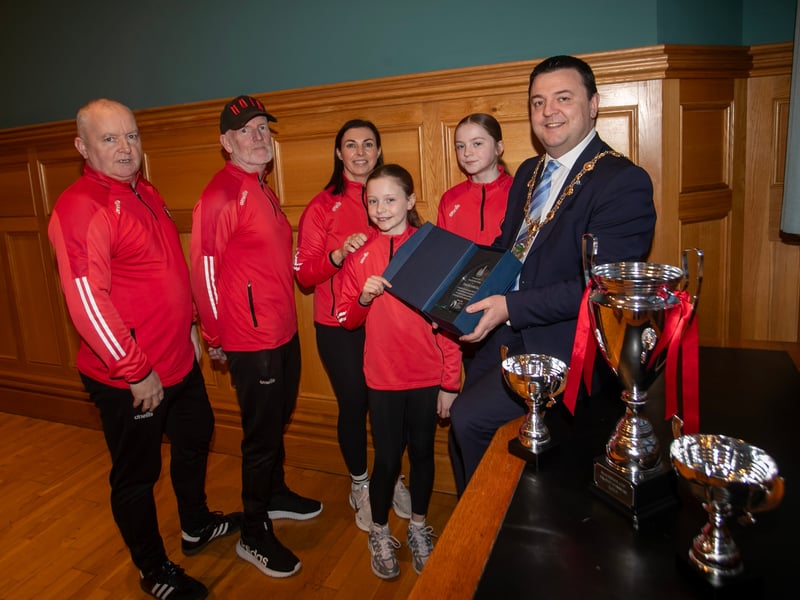 The Mayor of Derry City and Strabane District Council, Ruairi McHugh pictured at the Guildhall on Thursday evening making a special presentation to Tristar FC Girls captains Nicole Macari and Beau Faulkner in recognition of the team's recent achivements during the 2025 season and in appreciation of the commitment, teamwork and dedication of its young players, coaches, volunteers and families. Included from left are Shaun Condren, Club Chair and coach, and Mark Callaghan and Carla Crossan, coaches. (Photos: Jim McCafferty Photography)