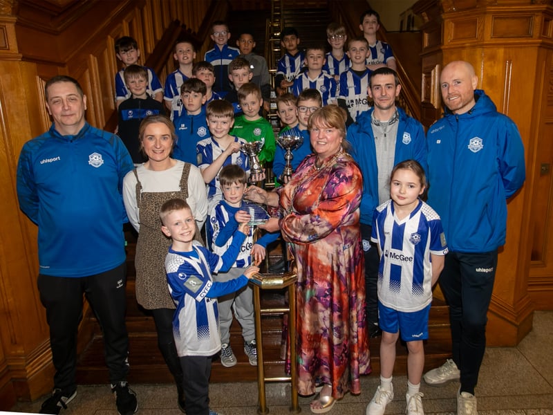 The. Deputy Mayor, Niree McMorris pictured with the 2016 combined teams of Culmore Youths FC and their coaches on Tuesday evening at the Guildhall, Derry.