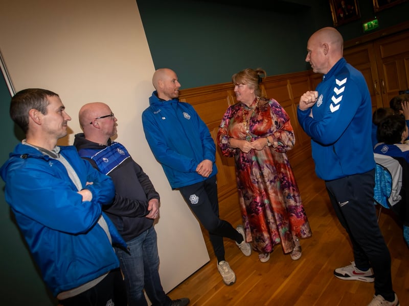 The Deputy Mayor Niree McMorris pictured chatting to some of the Culmore Youths FC coaches at Tuesday night's reception in the Guildhall.