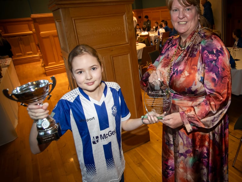 The Deputy Mayor Niree McMorris pictured with the only girl at Tuesday night's Culmore Youths FC reception in the Guildhall - 10 years-old Ruby McIvor. (Photos: Jim McCafferty Photography)