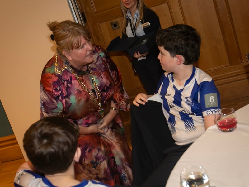 One of the young Culmore Youths FC players asking a question of Deputy Mayor Niree McMorris at Tuesday night's reception in the Guildhall.