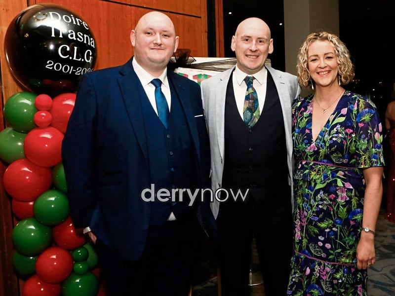 Conchur Carlin, club secretary, with Paul and Laura Horner.
