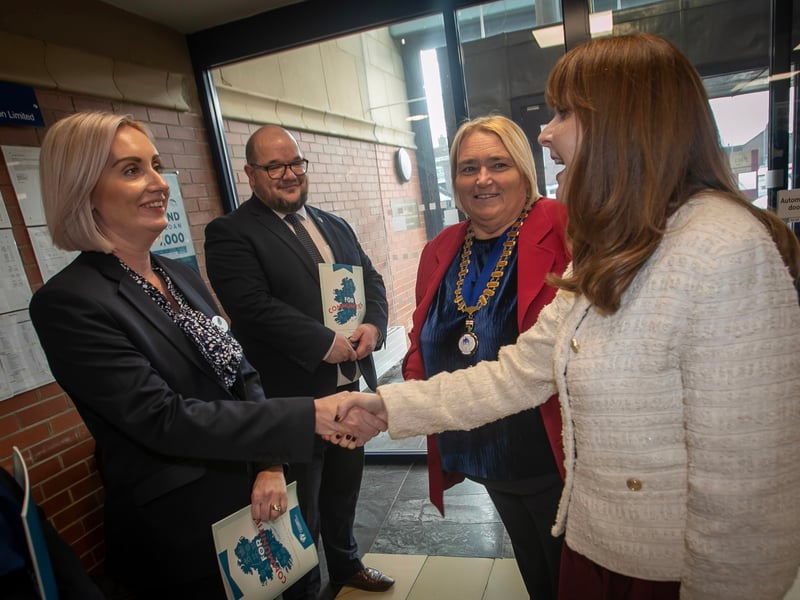 Minister for the Economy Dr. Caoimhe Archibald being introduced to Clare McLaughlin,, Head of Operations and Business, Derry Credit Union during Thursday's visit.