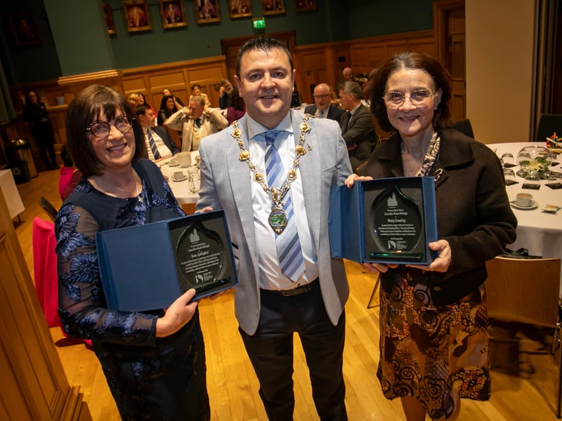 The Mayor of Derry City and Strabane District Council, Ruairi McHugh making a special presentation to retiring Derry Credit Union officers, Joan Gallagher and Mary Crumley at the Guildhall on Tuesday evening.