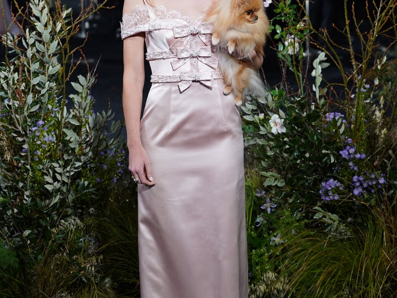 Alison Olivier, who plays Edgar’s younger sister Isabella Linton, also leant into dusty pink – a big colour on spring/summer 2026’s runways – wearing a silk and lace column dress with embellished bows adorning the bodice.