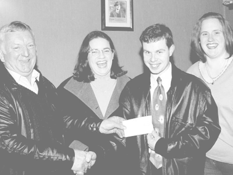 Use the Next > above or below to go through the gallery Caption: 2001: Micko Doyle, Chairman of Moydow GAA presenting Oliver Costelloe, Newtowncashel, the joint winner of the Moydow GAA Lotto draw with his cheque. Picture includes Mary Farrell (seller) and Claire Farrell