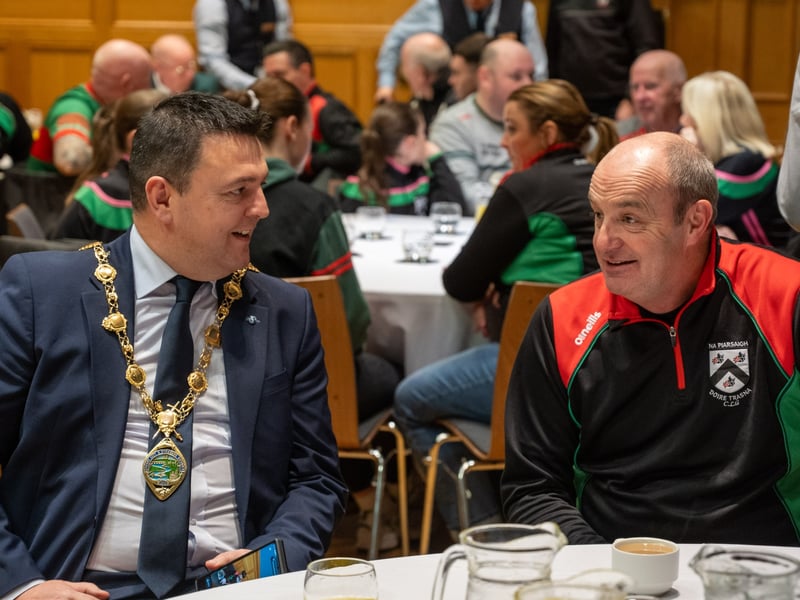 The Mayor Councillor Ruairi McHugh with Paul Simpson who is one of the founding members of Doire Trasna GAC Doire Trasna GAC.