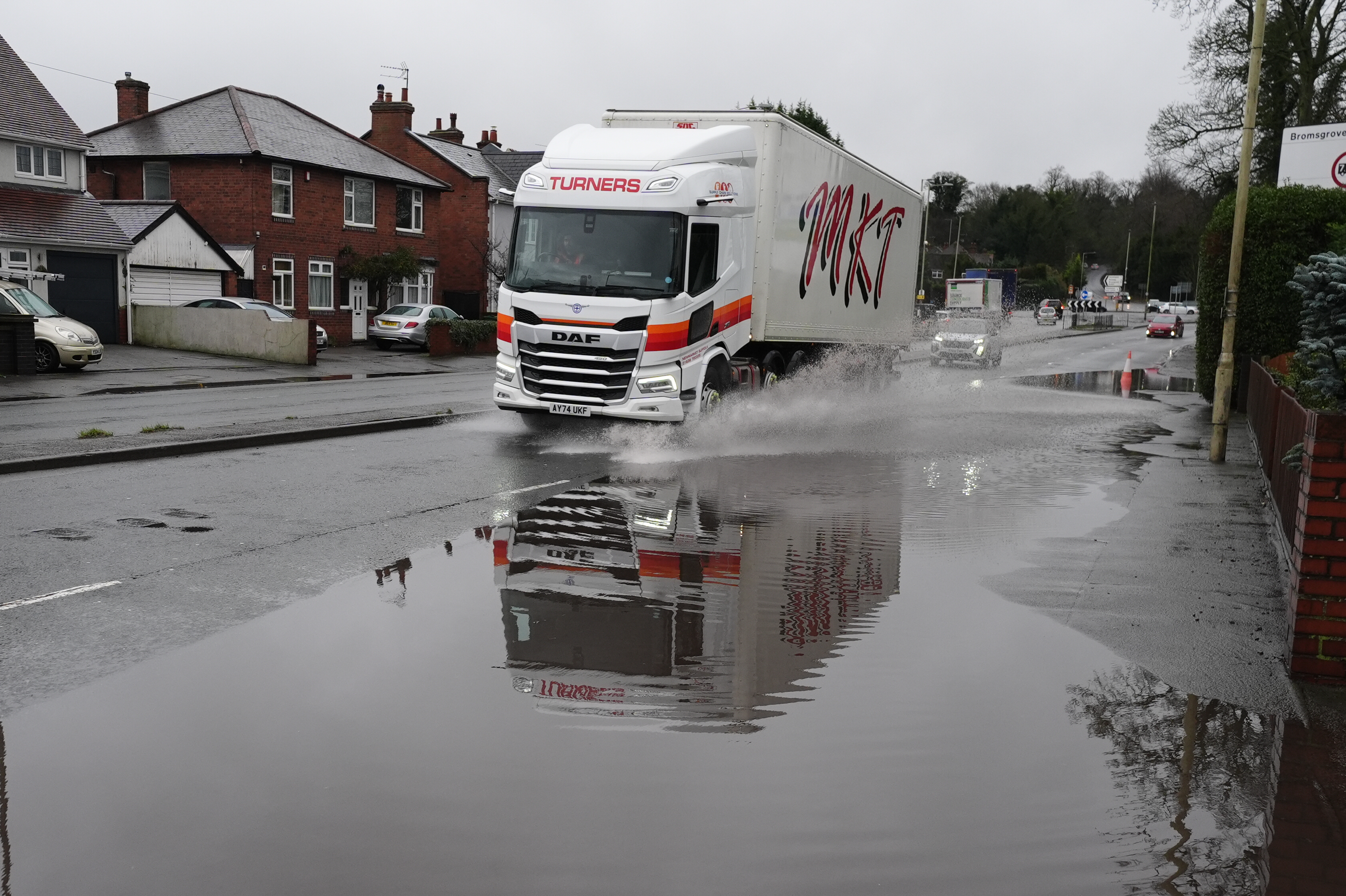 Most areas were hit by high winds and torrential rain while snow on higher ground added to the treacherous driving conditions.