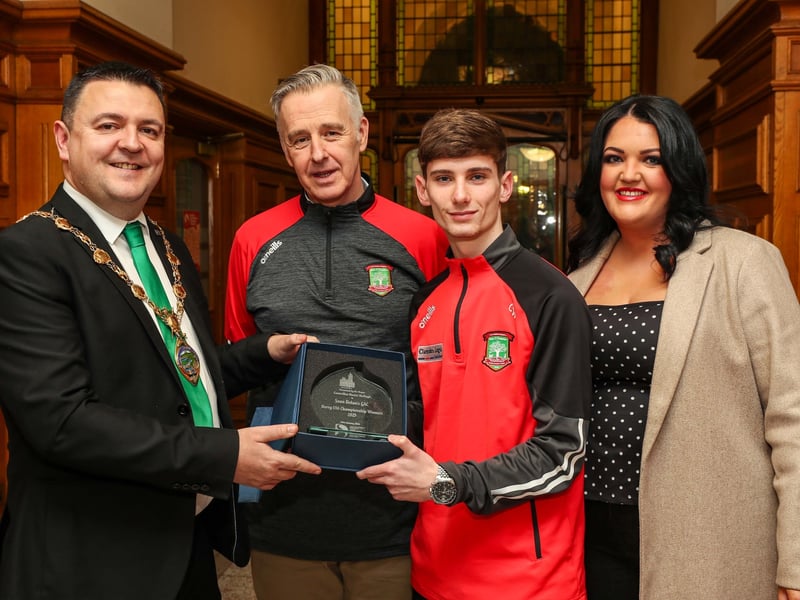 The Mayor of Derry and Strabane, Councillor Ruairi McHugh presenting a civic gift to Conor Ward, captain, Sean Dolan U-16 at a reception for the team who won the Derry County U-16 Championship. Included are Sean Mullan, and Councillor Emma McGinley.