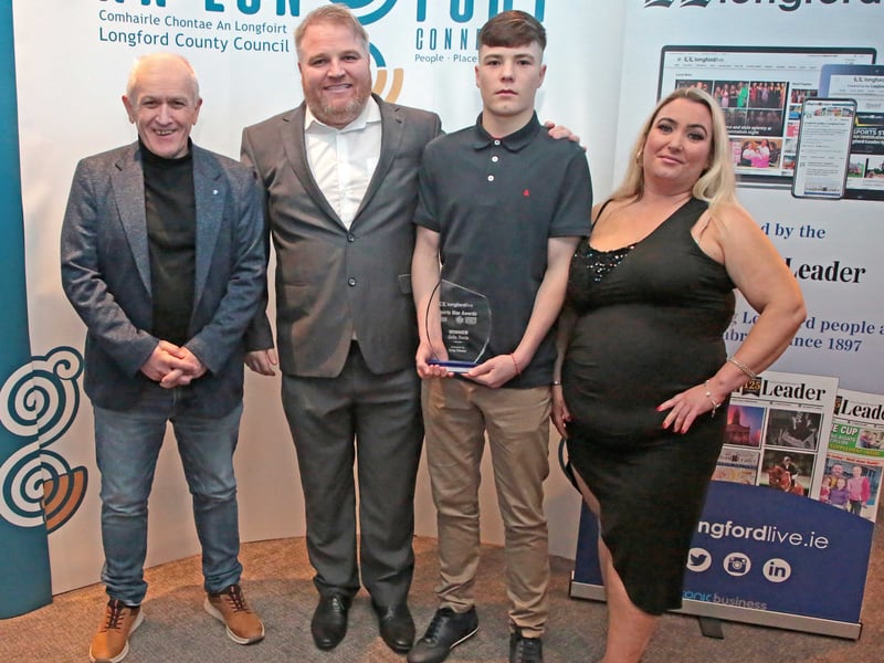 CAPTION: Longford Leader Sports Editor Padraic O'Brien, Martin, John (Boxing award winner) and Louise Nevin Picture: Shelley Corcoran
