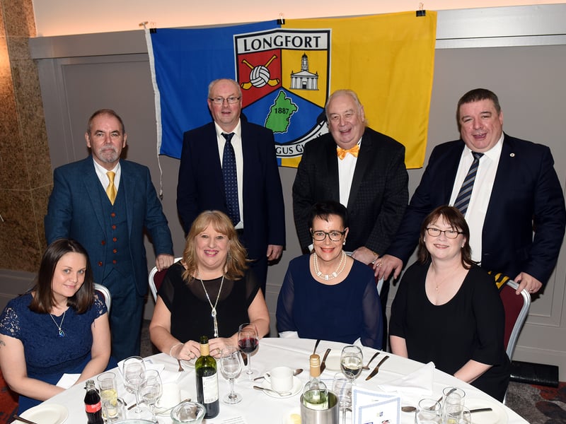 CAPTION: At the 66th Longford Association in London annual dinner dance at the Clayton Crown hotel in Cricklewood last Saturday night were standing l to r; Paul McGee, John Costello, John Shannon and Aiden Ganley. Seated l to r; Jenny McGee, Bernie Shannon, Teresa Costello and Mary Ganley. Picture: Malcolm McNally Photography