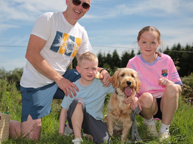 Caption: Gary, Tom and Ellie Brady with Henry who came 2nd in Show Puppy