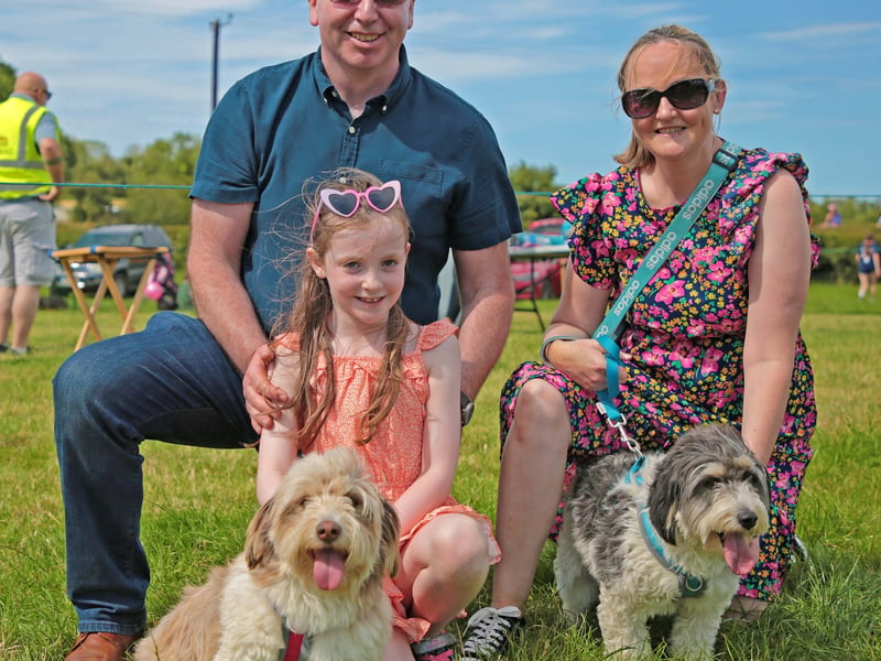 Caption: Mervin, Caroline, and Chloe McLoughlin, with Ben and Holly