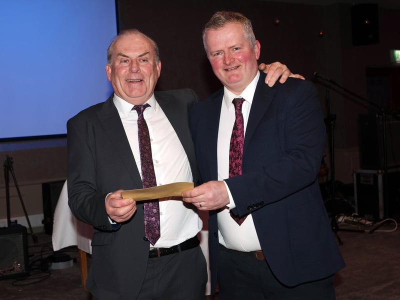 CAPTION: Grattan Og and Grattans Ladies presentation and social night. Grattan Og's sponsor Peter Cassidy, Castle Fencing make a presentation to chairperson Tommy Hawes. Photo: Syl Healy