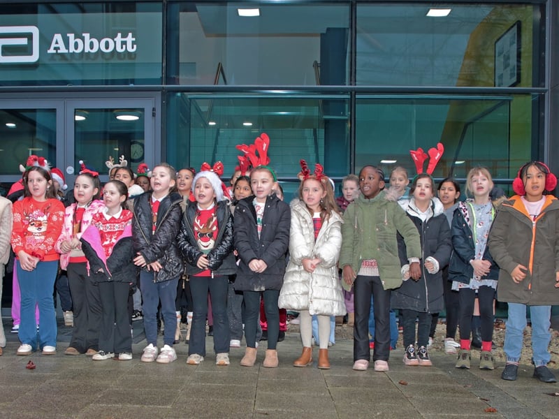 Caption: Students from St Joseph's NS standing outside Abbott's entrance. 