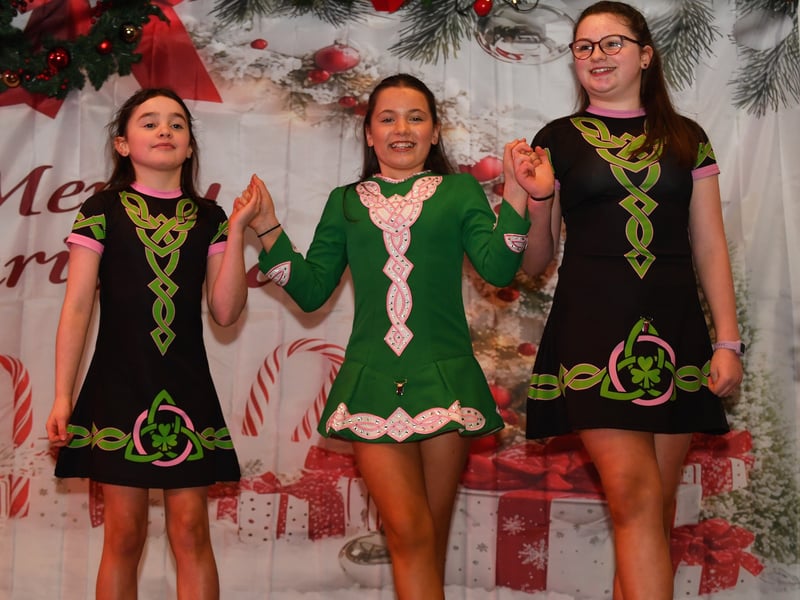 Caption: Kate Cummins, Abbey Kearney and Isabella Higgins kept the audience entertained with an Irish dancing set