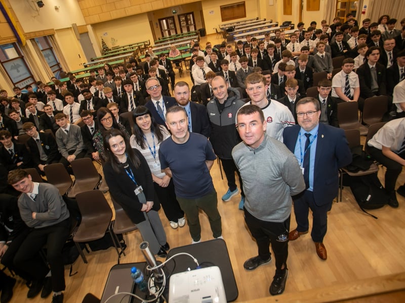 Oisin McConville, former Armagh GAA pictured with staff and students at St. Columb's College on Wednesday..