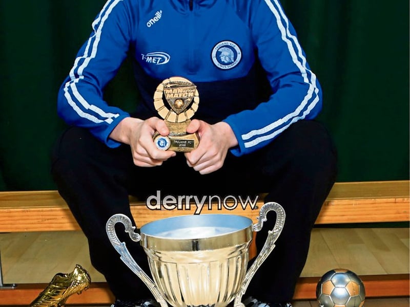 Josh Long U16 Player of the Year and the Jim Gallagher Man of the Match Award at Trojans annual presentation of awards held in Cecilia's College.