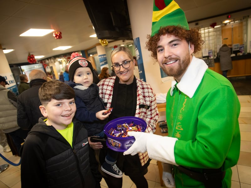 Grabbing a sweet or two from the Derry Credit Union's John Sheerin on Saturday.