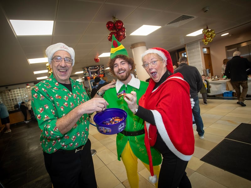 Two of the members of Momentum Choir grab a sweet during a break on Saturday. (Photos: Jim McCafferty Photography)
