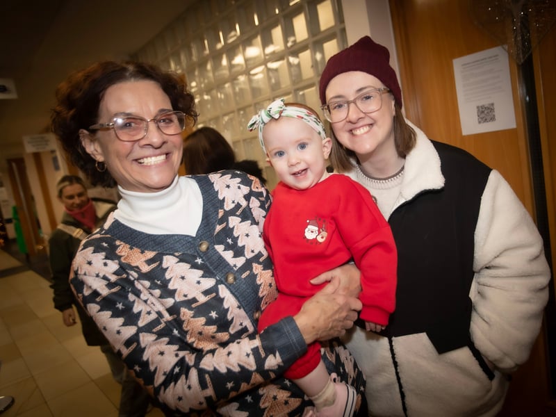 Retiriing Derry Credit Union Education and Training Officer Mary Crumley pictured at Santa Saturday with her daughter and granddaughter.