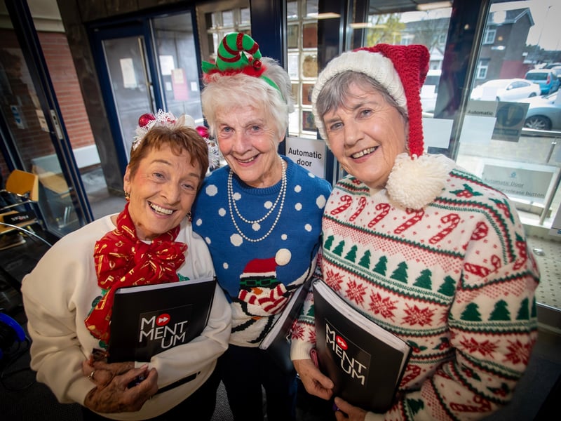 Some of the lovely ladies from the Momentum Choir posing for a photo during Derry Credit Union Santa Saturday event.