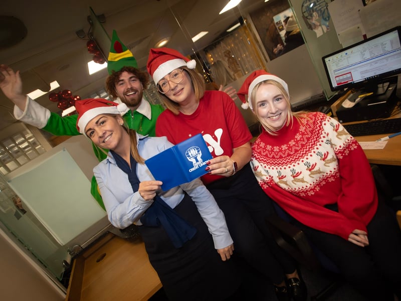 Derry Credit Union staff join in the Santa Saturday celebrations.