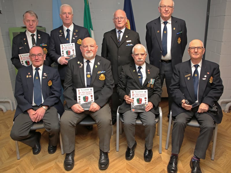 Caption: Hugh Farrell, with Ray Burton, Stephen Coy, Christy Devlin, Eddie Fitzgerald, Pat Grimes, Pat Tighe, Vincent Casey