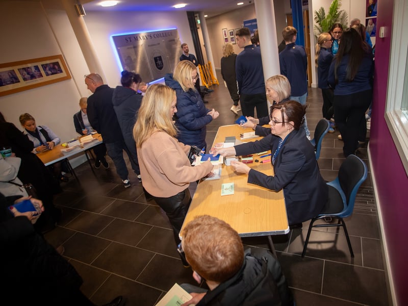 A busy night as Derry Credit Union members sign in at the Annual General Meeting.
