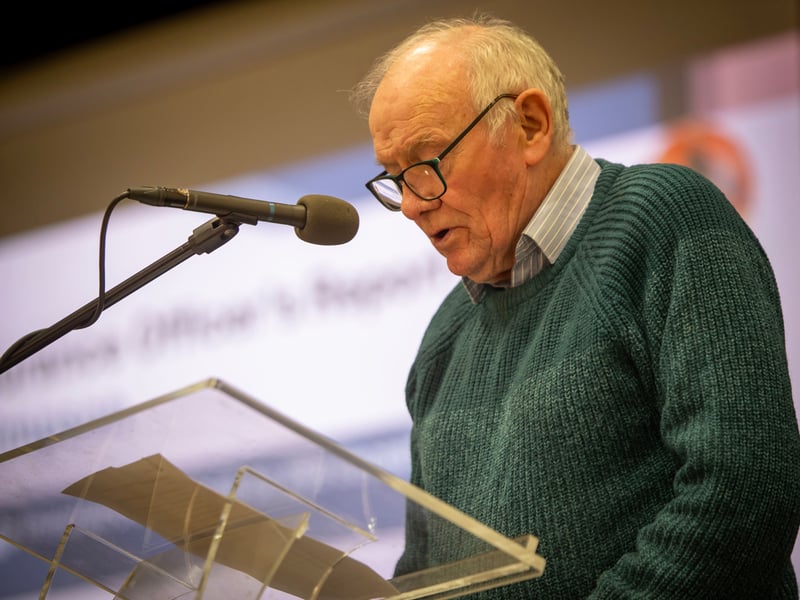 Long-serving committee member Leo Simpson reading the Insurance Officer's Report at Monday's Derry Credit Union AGM in St. Mary's College.