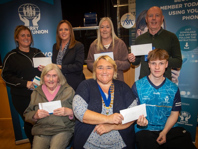 Prizewinners pictured at Monday night's Derry Credit Union AGM in St. Mary's College, Derry.