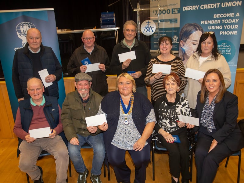 A section of the £100 prize draw winners pictured at Monday night's Derry Credit Union AGM in St. Mary's College, Derry.