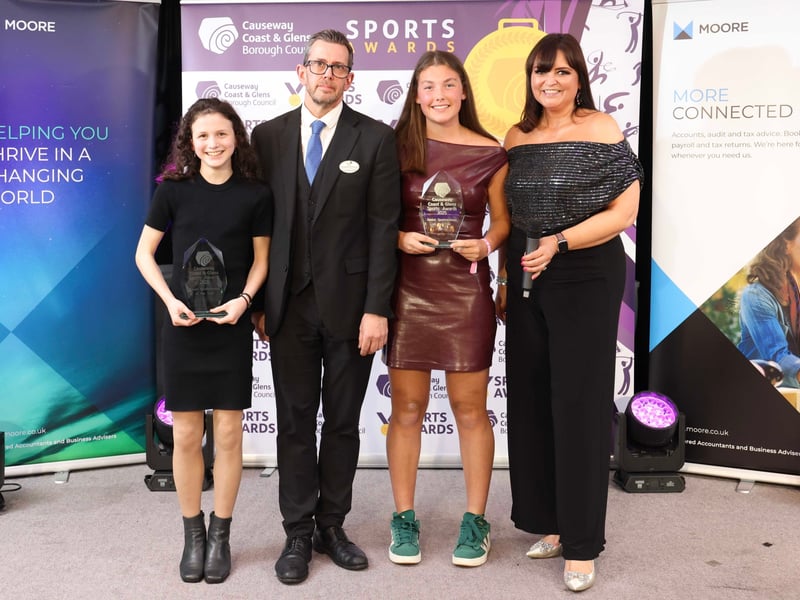 Junior Sportswoman joint winners, Charlotte Kasparian and Ruby Caddoo receiving their awards pictured with Denise Watson and Keith McGillivray from the Lodge Hotel who sponsored the award.