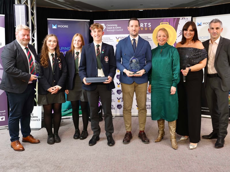 Joint Award winners of School of the year 2025 Millburn Primary and Coleraine Grammar photographed with host Denise Watson and Sponsor James Hislop School Pix.