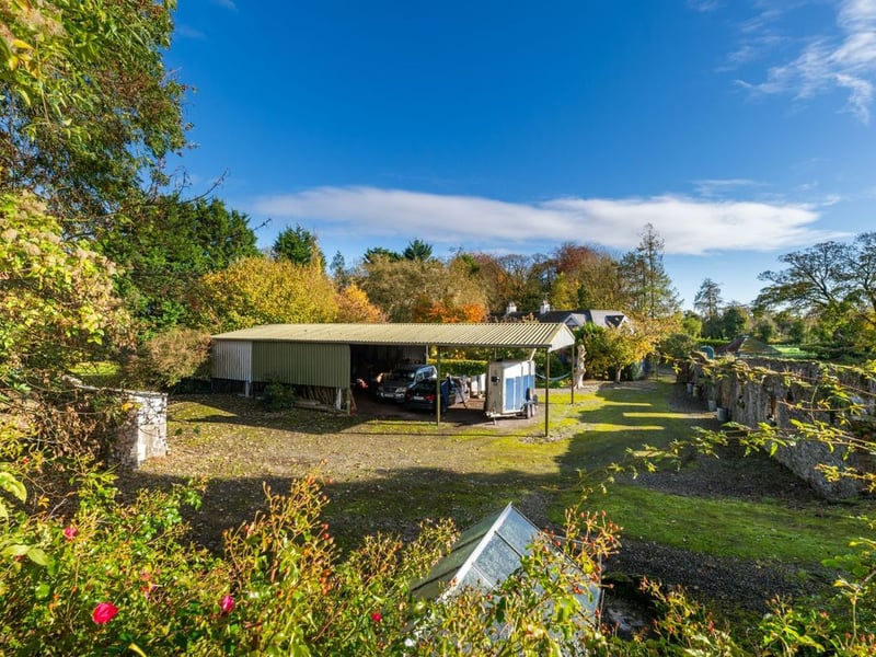 Like something out of The Secret Garden, a stunning period property built near Mountmellick by a historical figure has hit the market for €595,000. Set on 7.7 acres, The 200 year old Mill House promises stunning scenery, a gorgeous apple orchard, wildflower meadows and the ruins of the famous Mountmellick Mill. The Mill House, located in the townland of Drinagh, also known as New Mills, dates back to the early 1800s and carries a remarkable industrial heritage. The earliest records of New Mills appear in 1818, when Joseph Nevitt, noted in Quaker burial archives, resided here and later entered into partnership with John Millner. Together they established a thriving woollen manufacturing business, later expanding into a corn and saw mill. By the mid-1800s, the Millners’ enterprise was well known throughout the region, employing many locals and contributing to the area’s economic development. Elements of the original mill structures still remain on the property today, a lasting testament to the craftsmanship and industrious spirit of that era. Set on approximately 7.7 acres, The Mill House extends to c.214 m² and is surrounded by lavish, mature gardens, an orchard, wild meadow, and beautiful old trees, creating a sense of peace and privacy rarely found. The land is divided into four well-fenced paddocks, making it perfect for livestock or equestrian use thanks to its excellent security and layout. There is also a floodlit arena ideal for night-time riding out, offering superb convenience for horse owners. The current owners have lovingly preserved many of the original features, including stonework, arched brick detailing, and solid timber beams, showcasing the charm and authenticity of this extraordinary home. The accommodation consists of an entrance hall, kitchen cum dining room, living room, sitting room, home office, boot room, laundry, five bedrooms, main bathroom, and guest bathroom. Every room is filled with character, from exposed stone walls to original craftsmanship that reflects the history